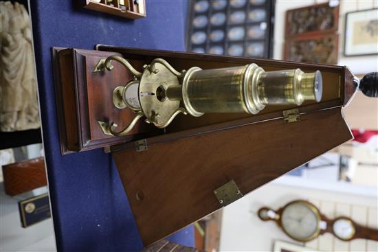 An early 19th century English brass Culpepper-type microscope, height 14in.; case height 17.5in.